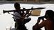 A Free Syrian Army fighter aims a RPG as he waits for Syrian Army tanks in the Salaheddine neighbourhood of central Aleppo August 10, 2012. REUTERS/Goran Tomasevic (SYRIA - Tags: CIVIL UNREST) A Free Syrian Army fighter aims a RPG as he waits for Syrian Army tanks in the Salaheddine neighbourhood of central Aleppo August 10, 2012. REUTERS/Goran Tomasevic (SYRIA - Tags: CIVIL UNREST)