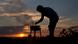 A man checks his barbecue as the sun sets at the former Tempelhof city airport, which became a public recreation area after its shutdown, in Berlin, Germany, Saturday, Aug. 4, 2012. (Foto:Gero Breloer/AP/dapd) A man checks his barbecue as the sun sets at the former Tempelhof city airport, which became a public recreation area after its shutdown, in Berlin, Germany, Saturday, Aug. 4, 2012. (Foto:Gero Breloer/AP/dapd)