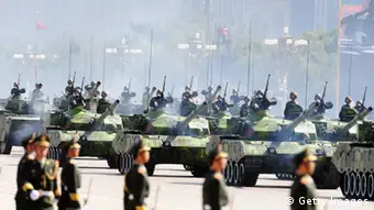 Chinese People's Liberation Army (PLA) tanks rumble past Tiananmen Square during the National Day parade in Beijing on October 1, 2009. AFP PHOTO/FREDERIC J. BROWN (Photo credit should read FREDERIC J. BROWN/AFP/Getty Images)