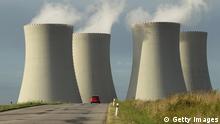 TEMELIN, CZECH REPUBLIC - AUGUST 11: Cars drive by the four cooling towers of the Temelin nuclear power plant on August 11, 2011 near Temelin, Czech Republic. CEZ, the Czech, state-owned energy company that operates Temelin, plans to expand the number of reactors at the plant from the current two to four. Westinghouse, Areva and Atomstroyexport are all vying for the project worth $27.8 billion, and a winner is to be announced before the end of the year. CEZ CEO Martin Roman also confirmed the company's hope to raise its electricity exports to Germany as Germany shutters its own 17 nuclear power reactors in coming years, a possibility that irritates German anti-nuclear activists. (Photo by Sean Gallup/Getty Images)