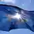 EU flag with blue sky as backdrop