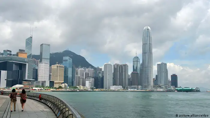 Panoramic view of the Victoria Harbor and skyscrapers and high-rise buildings in Central, Hong Kong, China, 27 June 2012. Chinas State Council, or the Cabinet, announced in late June measures aimed at boosting Hong Kongs anemic economic growth. The Cabinet said it will promote Hong Kongs status as a center for offshore finance using the mainlands tightly controlled currency, the yuan. It promised to encourage closer trade, education, science and technology, tourism and investment links.