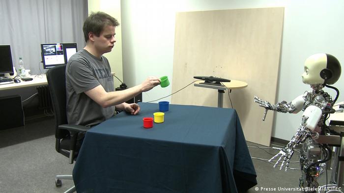 Icub learning with cups