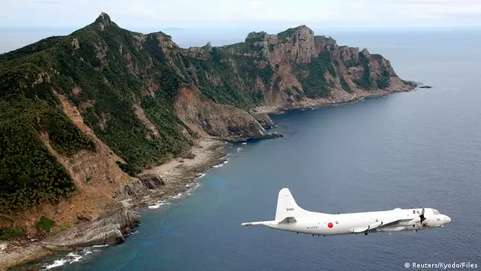 Japan Maritime Self-Defense Force's PC3 surveillance plane flies around the disputed islands in the East China Sea, known as the Senkaku isles in Japan and Diaoyu in China, in this October 13, 2011 file photo. Japan on July 31, 2012 flagged the Chinese army's growing role in shaping the country's foreign policy as a security risk, saying a sense of caution exists across East Asia about Beijing's apparent military expansion in the region. Picture taken October 13, 2011. MANDATORY CREDIT. REUTERS/Kyodo/Files (JAPAN - Tags: POLITICS MILITARY) FOR EDITORIAL USE ONLY. NOT FOR SALE FOR MARKETING OR ADVERTISING CAMPAIGNS. THIS IMAGE HAS BEEN SUPPLIED BY A THIRD PARTY. IT IS DISTRIBUTED, EXACTLY AS RECEIVED BY REUTERS, AS A SERVICE TO CLIENTS. MANDATORY CREDIT. JAPAN OUT. NO COMMERCIAL OR EDITORIAL SALES IN JAPAN. YES