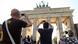 Tourists take photos of the Brandenburg Gate Tourists take photos of the Brandenburg Gate