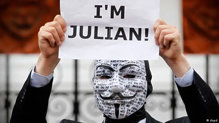 A supporter of WikiLeaks founder Julian Assange holds up a placard outside the Ecuadorian Embassy in central London, London, Thursday, Aug. 16, 2012. Assange entered the embassy in June in an attempt to gain political asylum to prevent him from being extradited to Sweden, where he faces allegations of sex crimes, which he denies. Ecuadorean Foreign Minister Ricardo Patino announced Thursday that he had granted political asylum to Assange, on the grounds he faces a serious threat of unjust prosecution at the hands of U.S. officials, a nod to the fears expressed by Assange and others that the Swedish sex case is merely the opening gambit in a Washington-orchestrated plot to make him stand trial in the United States.(AP Photo/Sang Tan)