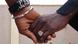 Two black hands entwined. Photo Katrin Gänsler Two black hands entwined. Photo Katrin Gänsler
