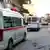 Fahrzeuge des syrischen Roten Kreuzes in Homs (Foto: dpa)