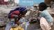 Children from Kibera, Africa's most populous slum, drink water from a broken pipe. Photo: EPA/STEPHEN MORRISON +++(c) dpa - Bildfunk+++ Children from Kibera, Africa's most populous slum, drink water from a broken pipe. Photo: EPA/STEPHEN MORRISON +++(c) dpa - Bildfunk+++