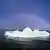 Ein Nebelbogen über einer Eisscholle auf Spitzbergen. Foto: dpa