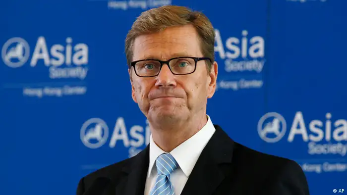 German Foreign Minister Guido Westerwelle speaks at a luncheon in Hong Kong Friday, Aug. 31, 2012. Guido Westerwelle said Friday that his country feels solidarity with Greece as it undertakes painful austerity reforms in order for it to continue receiving international funding protecting the debt-stricken Mediterranean country from bankruptcy. Westerwelle's comments to business leaders in Hong Kong are a sign that Germany hasn't become any more flexible towards Greece, whose leaders have been seeking some wiggle room on the cuts. (Foto:Kin Cheung/AP/dapd)