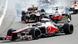 McLaren Formula One driver Jenson Button (Front C) of Britain leads the pack while Lotus Formula One driver Romain Grosjean (Back) of France crashes at the start of the Belgian Grand Prix in Spa Francorchamps September 2, 2012. McLaren Formula One driver Jenson Button (Front C) of Britain leads the pack while Lotus Formula One driver Romain Grosjean (Back) of France crashes at the start of the Belgian Grand Prix in Spa Francorchamps September 2, 2012.