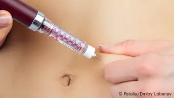 Diabetes dependent female doing human insulin shot by syringe pen with dose of lantus, subcutaneous abdomen injection therapy isolated on a white background toscana - Dmitry Lobanov - Fotolia 38277637