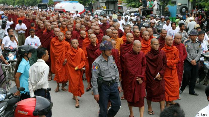 Myanmar Buddhist monks stage a rally to protest against ethnic minority Rohingya Muslims and to support Myanmar President Thein Sein's stance toward the sectarian violence that took place in June between ethnic Rakhine Buddhists and Rohingya Muslims in western Myanmar, in Mandalay, central Myanmar, on Sunday, Sept. 2, 2012. (AP Photo/Khin Maung Win)