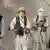 Vermummte Kämpfer der Taliban mit waffen (Foto: DPA)