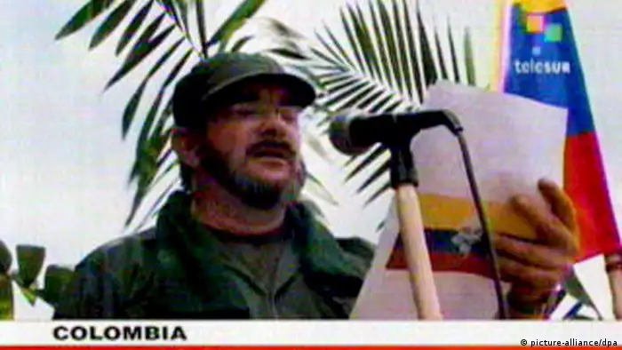 A TV video image captured off Venezuelan television network Telesur shows the Commander and member of the Central High Command Secretariat of the Revolutionary Armed Forces of Colombia - People's Army (FARC-EP)Rodrigo Londono-Echeverry a.k.a. 'Timoleon Jimenez' or 'Timochenko' who reads a press release some where in the Colombian jungle, 25 May 2008. The guerrilla commander announced and confirmed the dead of Pedro Antonio Marin, known as 'Manuel Marulanda Velez' a.k.a. 'Tirofijo' (Sureshot). EPA/TELESUR BEST QUALITY AVAILABLE EDITORIAL USE ONLY +++(c) dpa - Report+++