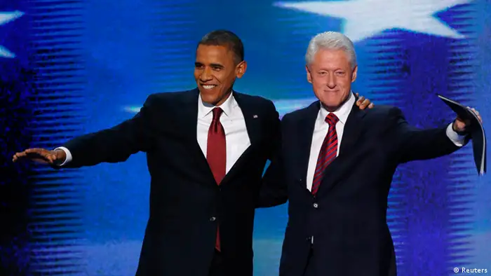 U.S. President Barack Obama (L) joins former President Bill Clinton onstage after Clinton nominated Obama for re-election during the second session of the Democratic National Convention in Charlotte, North Carolina, September 5, 2012. REUTERS/Jason Reed (UNITED STATES - Tags: POLITICS ELECTIONS)