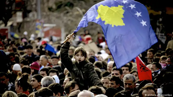 A Kosovo Albanian girl is holding a Kosovo flag as Kosovo Albanians take to the streets to mark the first anniversary of their declaration of independence from Serbia in Pristina, Kosovo on 17 February 2009. Kosovo declared independence on 17 February 2008. Recognised as independent by more than 50 countries including the United States and most EU states, but not recognised by others including Russia, China and Serbia, Kosovo's political stability is precarious. EPA/ERMAL META +++(c) dpa - Report+++