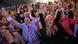 Supporters of Dutch prime minister and Liberal Party leader Mark Rutte celebrate after exit poll results for the parliamentary elections were announced in The Hague, Netherlands, Wednesday Sept. 12, 2012. An exit poll commissioned by the two biggest Dutch news broadcasters has predicted a narrow election victory for the Prime Minister Mark Rutte's free-market VVD party. The exit poll, which will be updated with late votes, gave the VVD 41 of the House of Representatives' 150 seats and the center-left Labor Party 40 votes. The poll has a 1.5 percent margin of error, and the broadcasters said the final result was still too close to call. (AP Photo/Ermindo Armino) Supporters of Dutch prime minister and Liberal Party leader Mark Rutte celebrate after exit poll results for the parliamentary elections were announced in The Hague, Netherlands, Wednesday Sept. 12, 2012. An exit poll commissioned by the two biggest Dutch news broadcasters has predicted a narrow election victory for the Prime Minister Mark Rutte's free-market VVD party. The exit poll, which will be updated with late votes, gave the VVD 41 of the House of Representatives' 150 seats and the center-left Labor Party 40 votes. The poll has a 1.5 percent margin of error, and the broadcasters said the final result was still too close to call. (AP Photo/Ermindo Armino)
