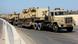 FILE - In this Aug. 9, 2012 file photo, army trucks carry Egyptian military tanks in El Arish, Egypt's northern Sinai Peninsula. President Mohammed Morsi is using former jihadists to mediate with radical Islamists in Sinai, trying to ensure a halt in militant attacks in return for a stop in a military offensive in the lawless peninsula, participants in the talks say. (AP Photo, File) FILE - In this Aug. 9, 2012 file photo, army trucks carry Egyptian military tanks in El Arish, Egypt's northern Sinai Peninsula. President Mohammed Morsi is using former jihadists to mediate with radical Islamists in Sinai, trying to ensure a halt in militant attacks in return for a stop in a military offensive in the lawless peninsula, participants in the talks say. (AP Photo, File)