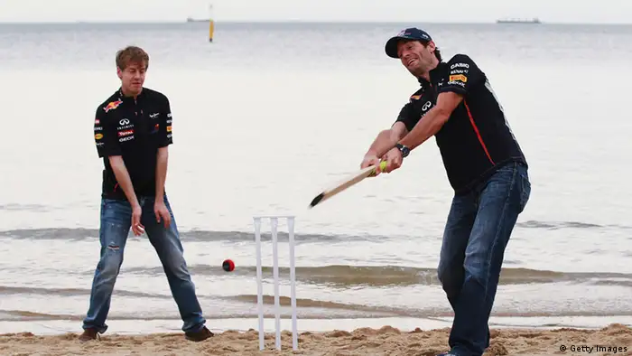MELBOURNE, AUSTRALIA - MARCH 14: (L-R) Sebastian Vettel of Germany and Red Bull Racing and Mark Webber of Australia and Red Bull Racing try their hand at beach cricket on St Kilda Beach during previews to the Australian Formula One Grand Prix on March 14, 2012 in Melbourne, Australia. (Photo by Mark Thompson/Getty Images)