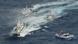A Japan Coast Guard's patrol boat, left bottom, discharges water against Taiwanese fishing boats near disputed islands called Senkaku in Japan and Diaoyu in China, in the East China Sea, Tuesday, Sept. 25, 2012. On Tuesday morning, about 50 Taiwanese fishing boats accompanied by 10 Taiwanese surveillance ships came within almost 20 kilometers (about 12 miles) of the disputed islands - within what Japan considers to be its territorial waters, said Yasuhiko Oku, an official with the Japanese coast guard. (Foto:Kyodo News/AP/dapd) JAPAN OUT, MANDATORY CREDIT, NO LICENSING IN CHINA, FRANCE, HONG KONG, JAPAN AND SOUTH KOREA A Japan Coast Guard's patrol boat, left bottom, discharges water against Taiwanese fishing boats near disputed islands called Senkaku in Japan and Diaoyu in China, in the East China Sea, Tuesday, Sept. 25, 2012. On Tuesday morning, about 50 Taiwanese fishing boats accompanied by 10 Taiwanese surveillance ships came within almost 20 kilometers (about 12 miles) of the disputed islands - within what Japan considers to be its territorial waters, said Yasuhiko Oku, an official with the Japanese coast guard. (Foto:Kyodo News/AP/dapd) JAPAN OUT, MANDATORY CREDIT, NO LICENSING IN CHINA, FRANCE, HONG KONG, JAPAN AND SOUTH KOREA