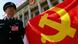 A Chinese policeman holds a Chinese Communist Party flag to show his supports to the party during the 17th Communist Party Congress in Beijing 15 October 2007. Chinese President Hu Jintao ended a long speech on 15 October outlining the Communist Party's performance and its major priorities for the economy, environment, military, Taiwan and social issues. AFP PHOTO/TEH ENG KOON (Photo credit should read TEH ENG KOON/AFP/Getty Images) A Chinese policeman holds a Chinese Communist Party flag to show his supports to the party during the 17th Communist Party Congress in Beijing 15 October 2007. Chinese President Hu Jintao ended a long speech on 15 October outlining the Communist Party's performance and its major priorities for the economy, environment, military, Taiwan and social issues. AFP PHOTO/TEH ENG KOON (Photo credit should read TEH ENG KOON/AFP/Getty Images)