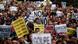 Protestors hold placards as they fill up Neptuno Square during a demonstration against government austerity measures in Madrid September 29, 2012. Photo: REUTERS/Sergio Perez Protestors hold placards as they fill up Neptuno Square during a demonstration against government austerity measures in Madrid September 29, 2012. Photo: REUTERS/Sergio Perez