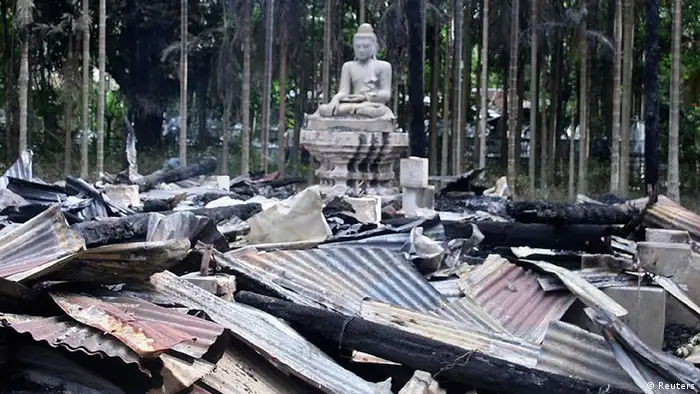 A temple burnt by Muslims is seen in Cox's Bazar September 30, 2012. Hundreds of Muslims in Bangladesh burned at least four Buddhist temples and 15 homes of Buddhists on Sunday after complaining that a Buddhist man had insulted Islam, police and residents said. REUTERS/Stringer (BANGLADESH - Tags: RELIGION CIVIL UNREST TPX IMAGES OF THE DAY)