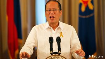 Philippine President Benigno Aquino delivers his speech on national television as his cabinet members listen, at the Malacanang palace in Manila October 7, 2012 (Photo: REUTERS/Cheryl Ravelo)