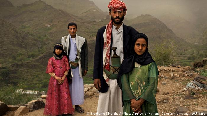The photo shows Tahani (in pink), who married her husband Majed when she was 6 and he was 25, posing for this portrait with former classmate Ghada, also a child bride, outside their mountain home in Hajjah, Yemen, June 10, 2010. Nearly half of all women in Yemen were married as children. (Photo:Stephanie Sinclair, VII Photo Agency for National Geographic magazine/AP/dapd)