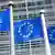 Флаги ЕС на фоне здания Еврокомиссии