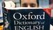 Man reading Oxford English Dictionary Man reading Oxford English Dictionary