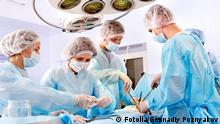 Surgeon at work in operating room. © Gennadiy Poznyakov #42703636