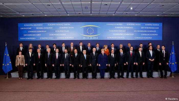 European Union leaders pose for a family photo at a EU summit in Brussels October 18, 2012. EU leaders will try to bridge deep differences over plans for a banking union at a summit on Thursday but no substantial decisions are expected, reviving concerns about complacency in tackling the three-year-old debt crisis. REUTERS/Christian Hartmann (BELGIUM - Tags: POLITICS BUSINESS)