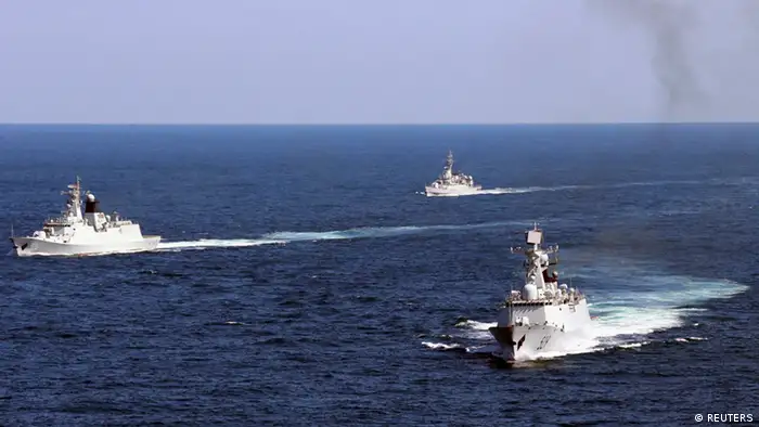 Vessels roam the waters of the East China Sea during a naval exercise, October 19, 2012. The Chinese navy conducted a joint exercise in the East China Sea with the country's fishery administration and marine surveillance agency on Friday. 11 vessels, eight planes and more than 1000 personnels took part in the drill, according to local reports. REUTERS/China Daily (CHINA - Tags: MILITARY) CHINA OUT. NO COMMERCIAL OR EDITORIAL SALES IN CHINA