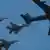 An Israeli Air Force Boeing 707 refuels three F15I fighter jets during an acrobatics display during a graduation ceremony at the Hatzerim Air Force base near the southern city of Beersheba, Israel,Thursday, June 28, 2012. The pilots, who train for three years, will fly all types of military aircraft including combat and attack helicopter. (Foto:Ariel Schalit/AP/dapd)