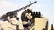 epa03444170 A Libyan government fighter checks his weapon as they advance towards the entrance to the town of Bani Walid, which is witnessing clashes between the army and some loyalists of the former Gaddafi regime, some 185 km south of the capital Libyan capital Tripoli, Libya, 23 October 2012. According to media reports on 22 October, the Libyan army has seized most of the south-eastern town of Bani Walid, where it is pursuing a campaign against rogue militias. The Libyan army on 20 October launched a massive-scale attack on Bani Walid after a siege of more than two weeks. EPA/STR +++(c) dpa - Bildfunk+++ epa03444170 A Libyan government fighter checks his weapon as they advance towards the entrance to the town of Bani Walid, which is witnessing clashes between the army and some loyalists of the former Gaddafi regime, some 185 km south of the capital Libyan capital Tripoli, Libya, 23 October 2012. According to media reports on 22 October, the Libyan army has seized most of the south-eastern town of Bani Walid, where it is pursuing a campaign against rogue militias. The Libyan army on 20 October launched a massive-scale attack on Bani Walid after a siege of more than two weeks. EPA/STR +++(c) dpa - Bildfunk+++