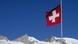 Schweizer Flagge über Berggipfeln (Foto: picture-alliance/dpa) Schweizer Flagge über Berggipfeln (Foto: picture-alliance/dpa)