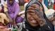 Source News Feed: EMEA Picture Service ,Germany Picture Service A girl covers her face as she waits for the start of Eid al-Adha prayers in Lagos October 26, 2012. Muslims around the world celebrate Eid-al-Adha to mark the end of the Haj by slaughtering sheep, goats, cows and camels to commemorate Prophet Abraham's willingness to sacrifice his son Ismail on God's command. REUTERS/Akintunde Akinleye(NIGERIA - Tags: RELIGION SOCIETY) Source News Feed: EMEA Picture Service ,Germany Picture Service A girl covers her face as she waits for the start of Eid al-Adha prayers in Lagos October 26, 2012. Muslims around the world celebrate Eid-al-Adha to mark the end of the Haj by slaughtering sheep, goats, cows and camels to commemorate Prophet Abraham's willingness to sacrifice his son Ismail on God's command. REUTERS/Akintunde Akinleye(NIGERIA - Tags: RELIGION SOCIETY)