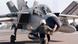 Einer der acht deutschen ECR-Tornado Jagdbomber wird am 21.1.1999 auf der Basis Piacenza von einem Lotsen zu seiner Parkposition geleitet. Angesichts der zugespitzten Lage im Kosovo hat die Bundeswehr am 21.1. acht ECR-Tornados von ihrem Fliegerhorst Lechfeld auf den italienischen Militärstützpunkt Piacenza verlegt. Wie das Verteidigungsministerium in Bonn mitteilte, stehen die deutschen Kampfmaschinen dort für einen möglichen Einsatz im Kosovo, an dem auch andere Nato-Flugzeuge teilnehmen würden, in einer 48-Stunden-Bereitschaft. Einer der acht deutschen ECR-Tornado Jagdbomber wird am 21.1.1999 auf der Basis Piacenza von einem Lotsen zu seiner Parkposition geleitet. Angesichts der zugespitzten Lage im Kosovo hat die Bundeswehr am 21.1. acht ECR-Tornados von ihrem Fliegerhorst Lechfeld auf den italienischen Militärstützpunkt Piacenza verlegt. Wie das Verteidigungsministerium in Bonn mitteilte, stehen die deutschen Kampfmaschinen dort für einen möglichen Einsatz im Kosovo, an dem auch andere Nato-Flugzeuge teilnehmen würden, in einer 48-Stunden-Bereitschaft.