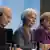 Bundeskanzlerin Angela Merkel sitzt bei der Pressekonferenz zwischen Weltbankpräsident Jim Yong Kim, WTO-Chef Pascal Lamy und IWF Direktorin Christine Lagarde. Foto: REUTERS/Thomas Peter