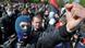 Hundreds of protestors wearing balaclavas and holding strongly colored nationalist flags demonstrate angrily in the daytime. (Photo: ITAR-TASS/ Vitaliy Hrabar) Hundreds of protestors wearing balaclavas and holding strongly colored nationalist flags demonstrate angrily in the daytime. (Photo: ITAR-TASS/ Vitaliy Hrabar)
