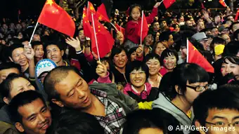 Viele Menschen auf engem Raum in China