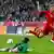 Bayern Munich's Toni Kroos tries to score against Eintracht Frankfurt's goalkeeper Kevin Trapp