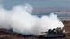 GOLAN HEIGHTS - NOVEMBER 13: (ISRAEL OUT) An Israeli Merkava tank releases white smoke as it maneuvers on the border line with Syria at the Israeli-annexed Golan Heights, overlooking the Syrian village of Breqa on November 13, 2012 in the Golan Heights. Tension remains high in the disputed Golan Heights after Israeli Defence Forces retaliated after mortar shells were fired into Israeli territory from Syria. (Photo by Uriel Sinai/Getty Images) GOLAN HEIGHTS - NOVEMBER 13: (ISRAEL OUT) An Israeli Merkava tank releases white smoke as it maneuvers on the border line with Syria at the Israeli-annexed Golan Heights, overlooking the Syrian village of Breqa on November 13, 2012 in the Golan Heights. Tension remains high in the disputed Golan Heights after Israeli Defence Forces retaliated after mortar shells were fired into Israeli territory from Syria. (Photo by Uriel Sinai/Getty Images)
