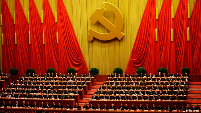 Delegates attend the closing session of 18th National Congress of the Communist Party of China at the Great Hall of the People in Beijing, November 14, 2012. REUTERS/Jason Lee (CHINA - Tags: POLITICS)