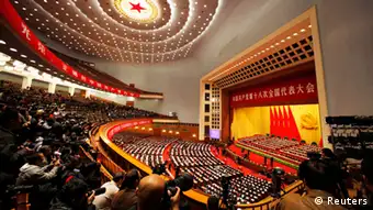 A general view shows delegates attending the closing session of 18th National Congress of the Communist Party of China at the Great Hall of the People in Beijing, November 14, 2012. REUTERS/Carlos Barria (CHINA - Tags: POLITICS)