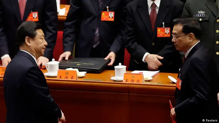 China's Vice President Xi Jinping (front L) and China's Vice-Premier Li Keqiang (front R) leave their seats after the closing session of 18th National Congress of the Communist Party of China at the Great Hall of the People in Beijing, November 14, 2012. China's Communist Party congress offered the first clues on a generational leadership change on Wednesday as Xi Jinping and Li Keqiang took the first step to the presidency and premiership, respectively. The 2,270 carefully vetted delegates cast their votes behind closed doors in Beijing's cavernous Great Hall of the People for the new Central Committee, a ruling council with around 200 full members and 170 or so alternate members with no voting rights. REUTERS/Jason Lee (CHINA - Tags: POLITICS)