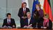 (2nd Row L-R) Polish Prime Minister Donald Tusk and German Chancellor Angela Merkel watch as Polish Transportation Minister Slawomir Nowak (L) and his German counterpart Peter Ramsauer (C) sign an agreement on interstate railway transportation at the Chancellery in Berlin on November 14, 2012 after talks focused on the forthcoming EU summit on the bloc's seven-year budget. AFP PHOTO / ODD ANDERSEN (Photo credit should read ODD ANDERSEN/AFP/Getty Images) (2nd Row L-R) Polish Prime Minister Donald Tusk and German Chancellor Angela Merkel watch as Polish Transportation Minister Slawomir Nowak (L) and his German counterpart Peter Ramsauer (C) sign an agreement on interstate railway transportation at the Chancellery in Berlin on November 14, 2012 after talks focused on the forthcoming EU summit on the bloc's seven-year budget. AFP PHOTO / ODD ANDERSEN (Photo credit should read ODD ANDERSEN/AFP/Getty Images)